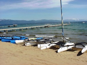 Beach, pier & sail boats